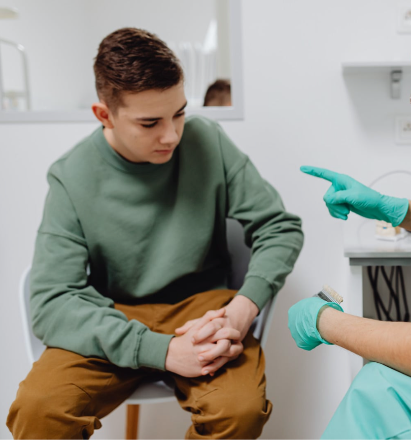 Teenage boy in doctor's office Adolescent boy in doctor's office