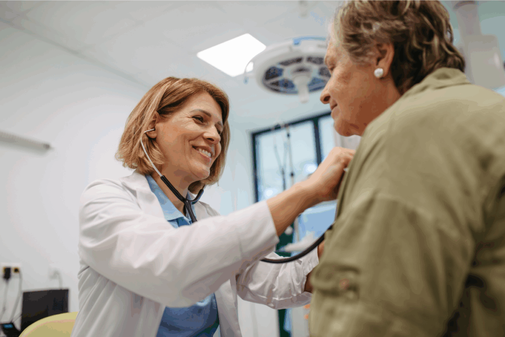 Woman doctor tending to patient