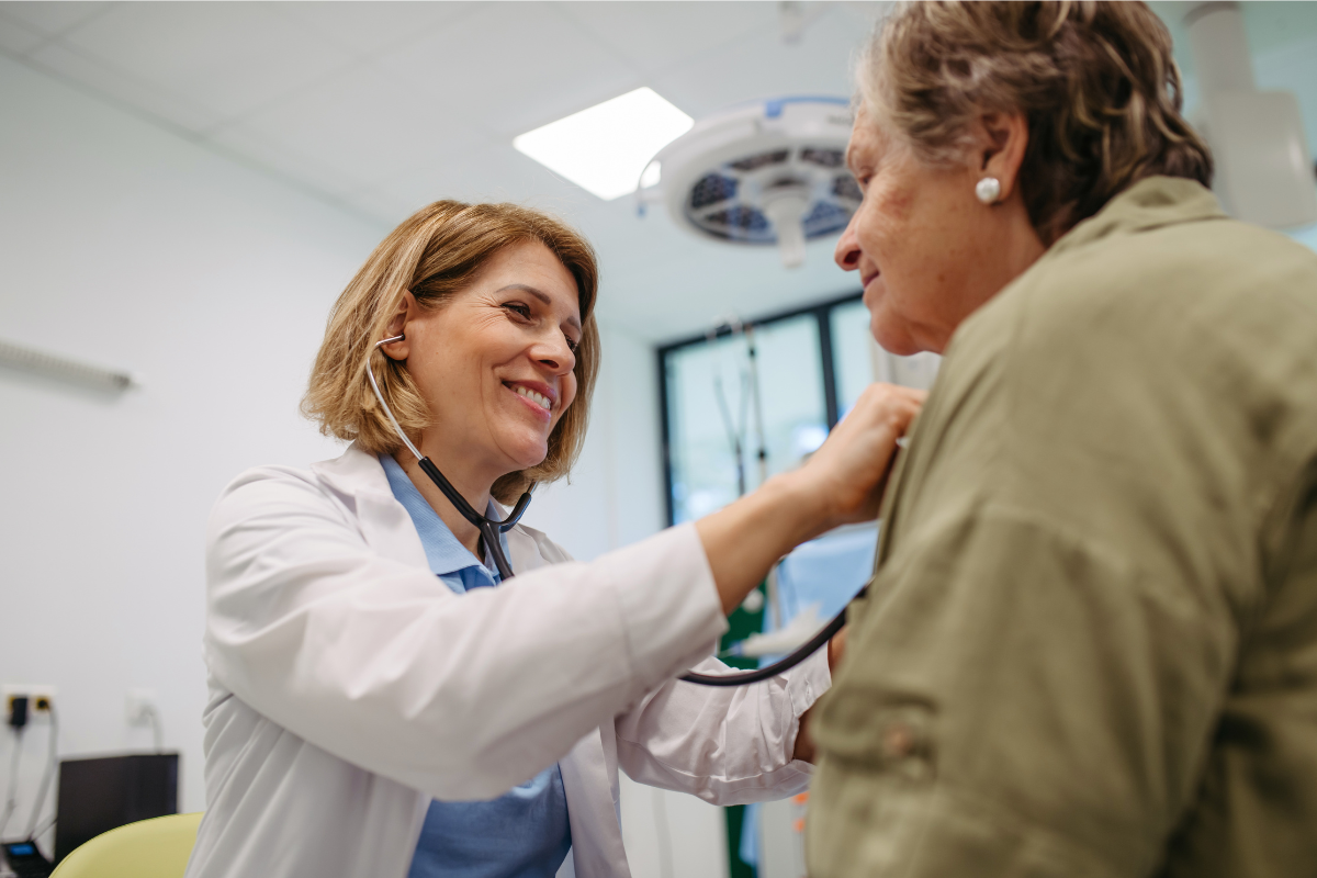 Woman doctor tending to patient
